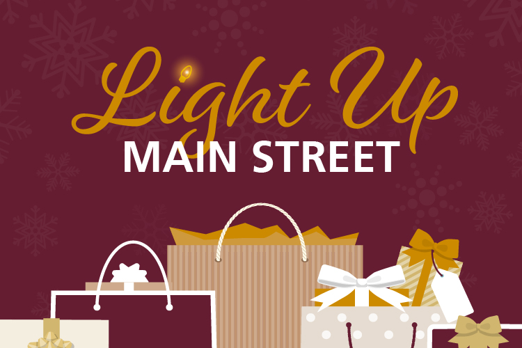 static design that reads "Light Up Main Street"
