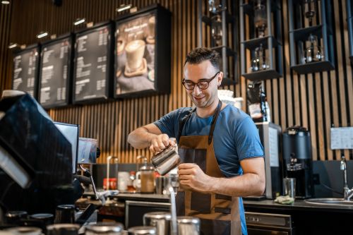 barista making coffee