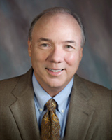 Professional headshot of Michael Rogers.