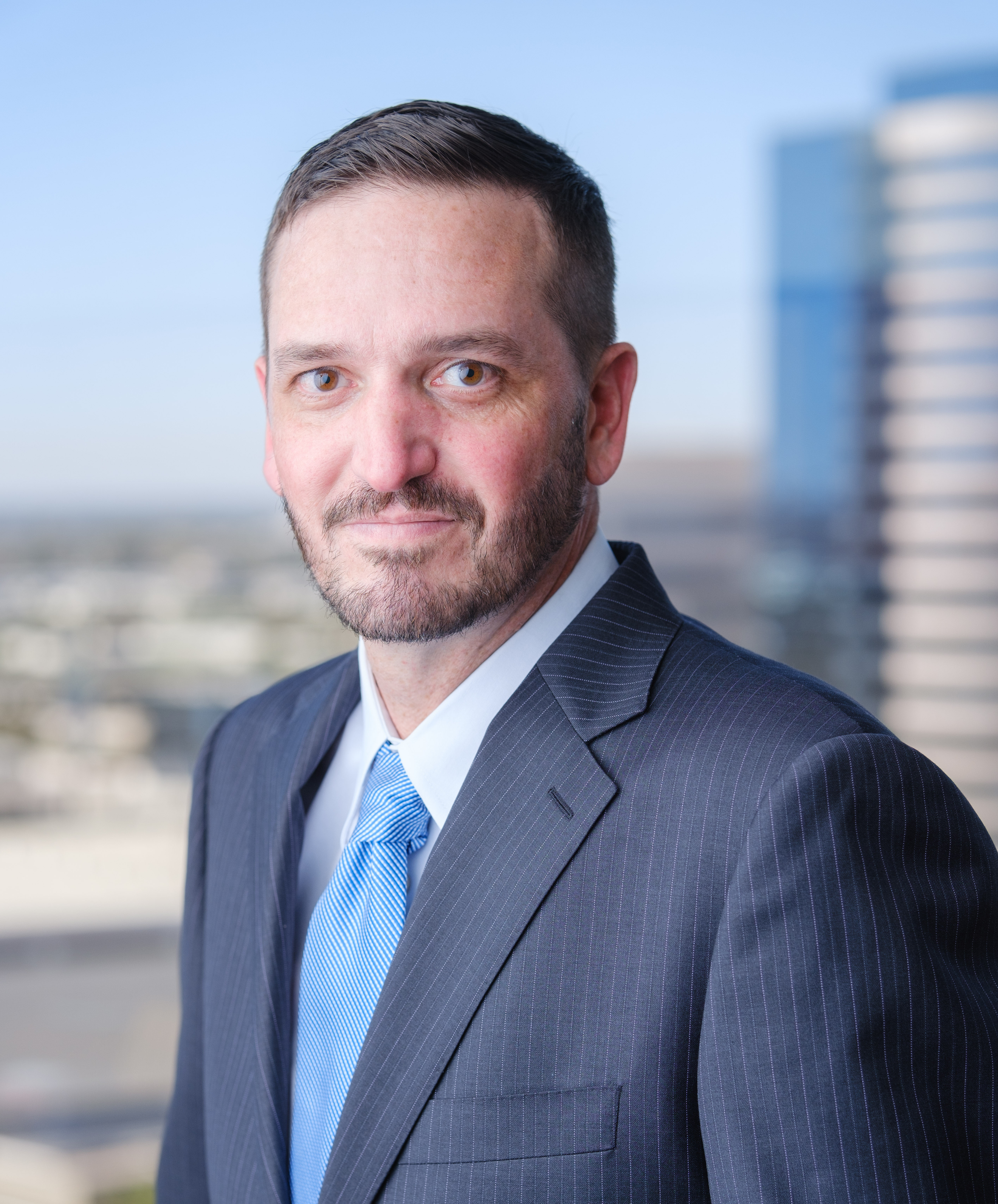 Professional headshot of Mark DeWitt.