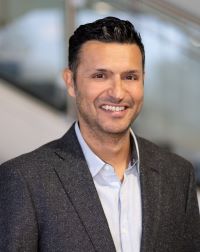 Professional headshot of Yusuf Haschemi.