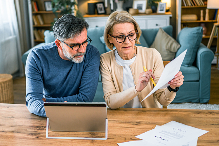 older couple reviewing paperwork