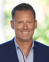Professional headshot of Chad Smart.